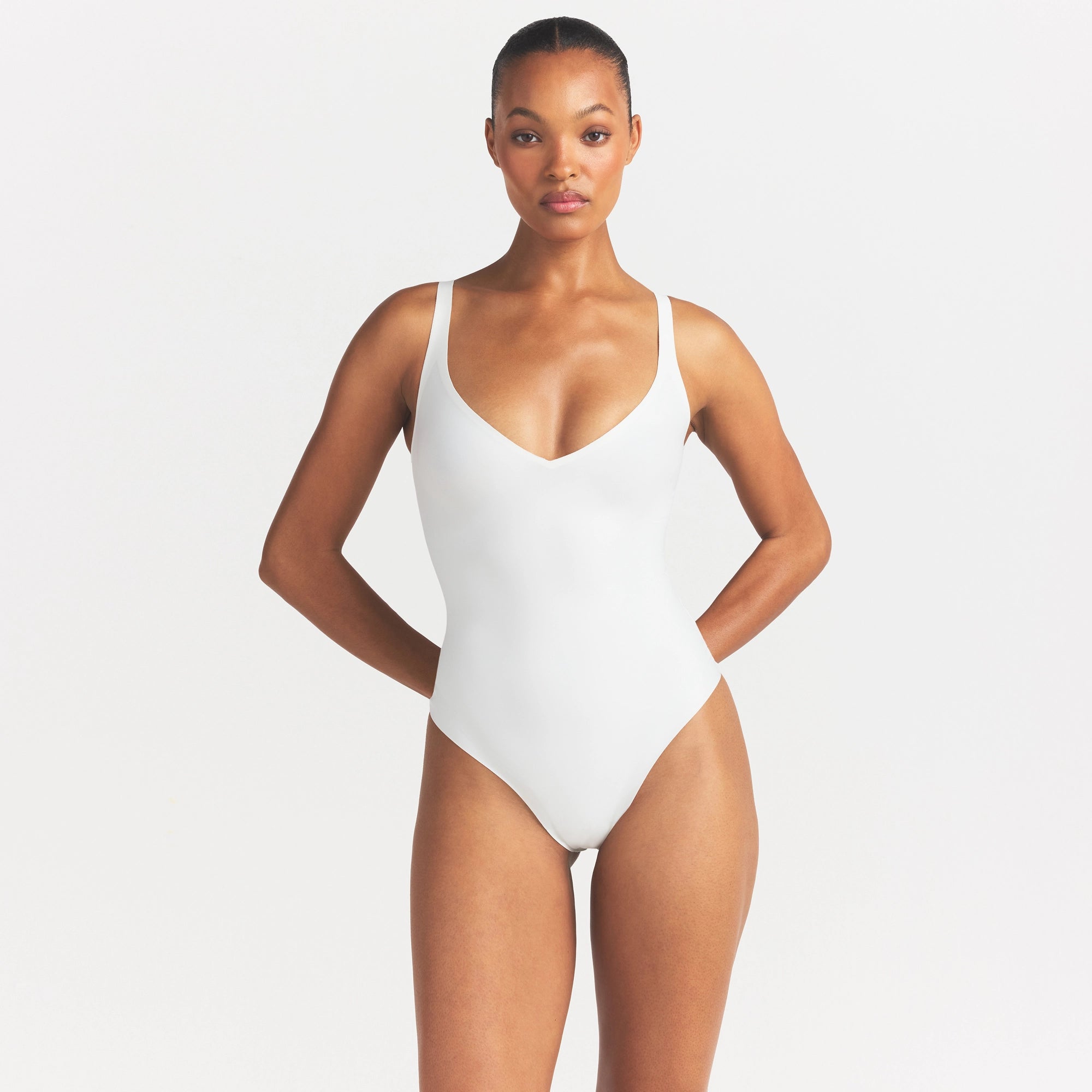 SKIMS BODY UNLINED PLUNGE THONG BODYSUIT | IVORY - Image 3