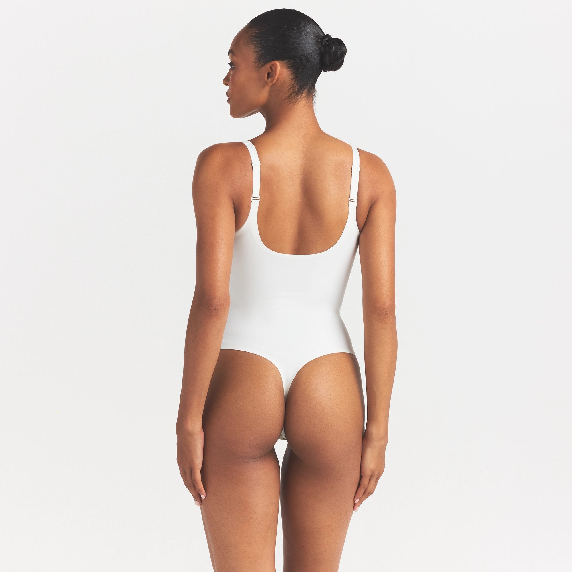 SKIMS BODY UNLINED PLUNGE THONG BODYSUIT | IVORY - Image 4