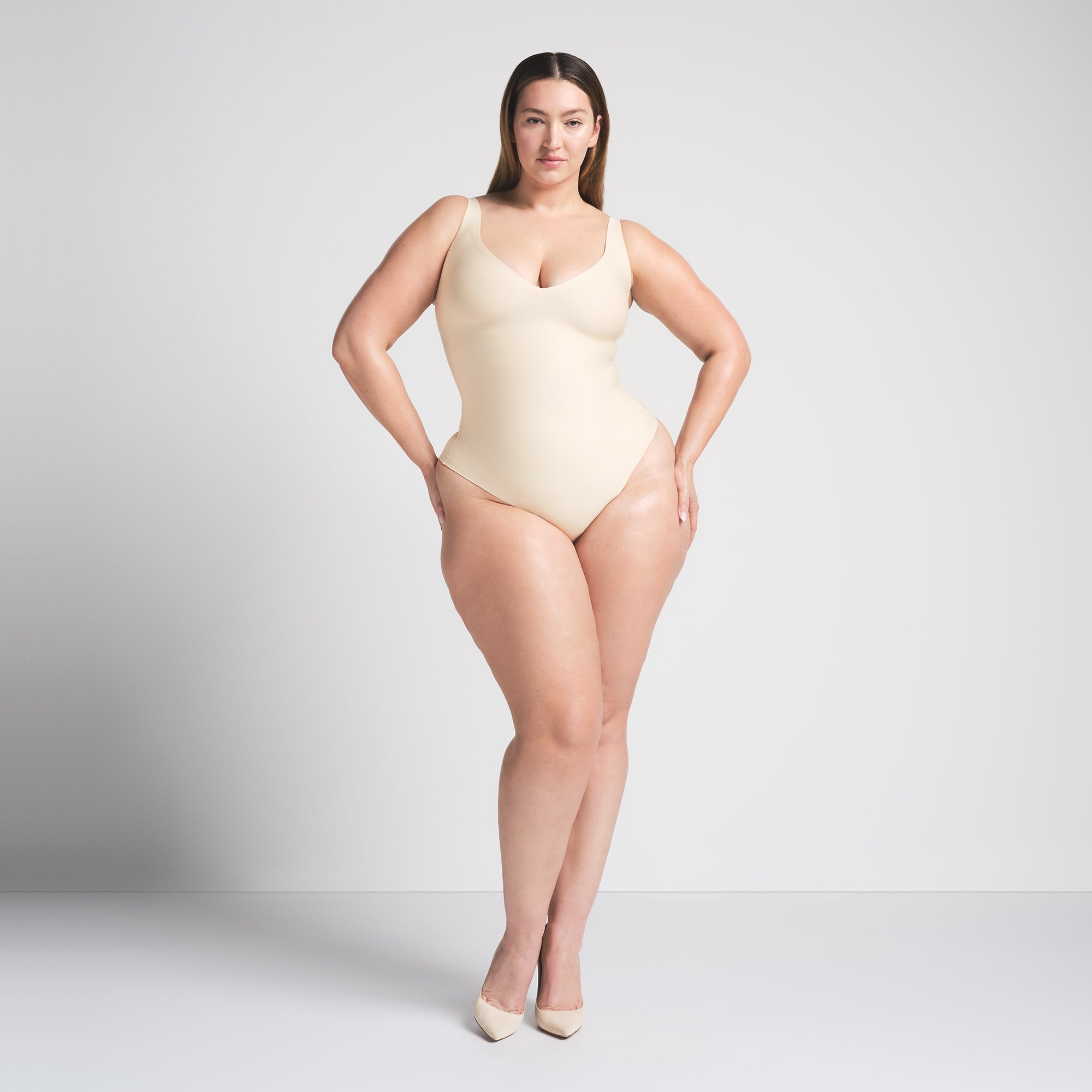 SKIMS BODY UNLINED PLUNGE THONG BODYSUIT | SAND - Image 3