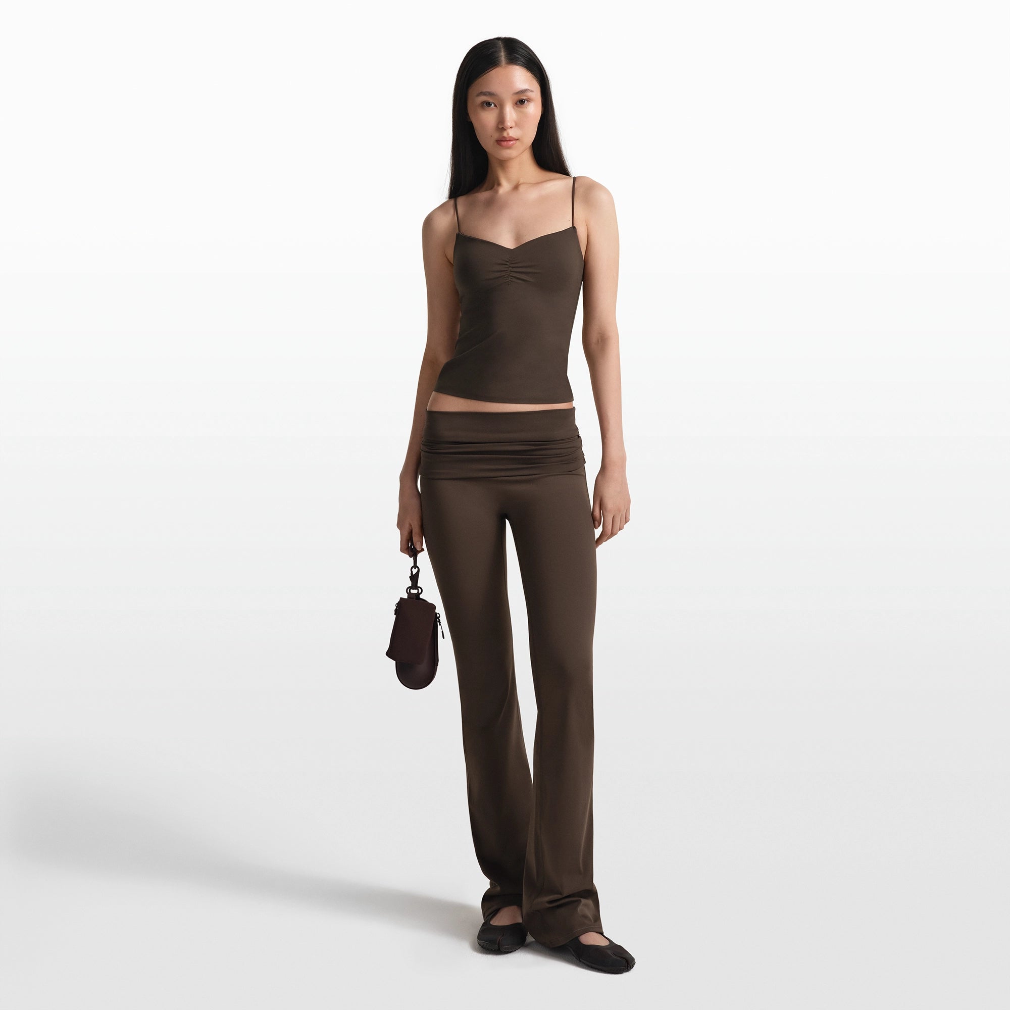 NikeSKIMS MATTE FOLDOVER SLIM FLARE LEGGING | DARK SEPIA - Image 2