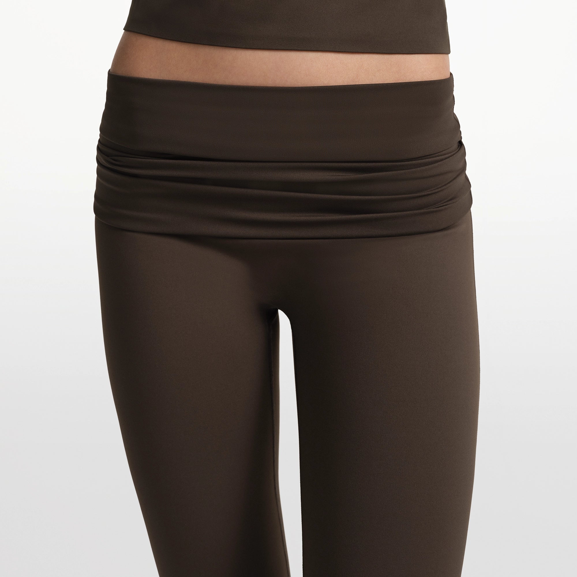 NikeSKIMS MATTE FOLDOVER SLIM FLARE LEGGING | DARK SEPIA - Image 5