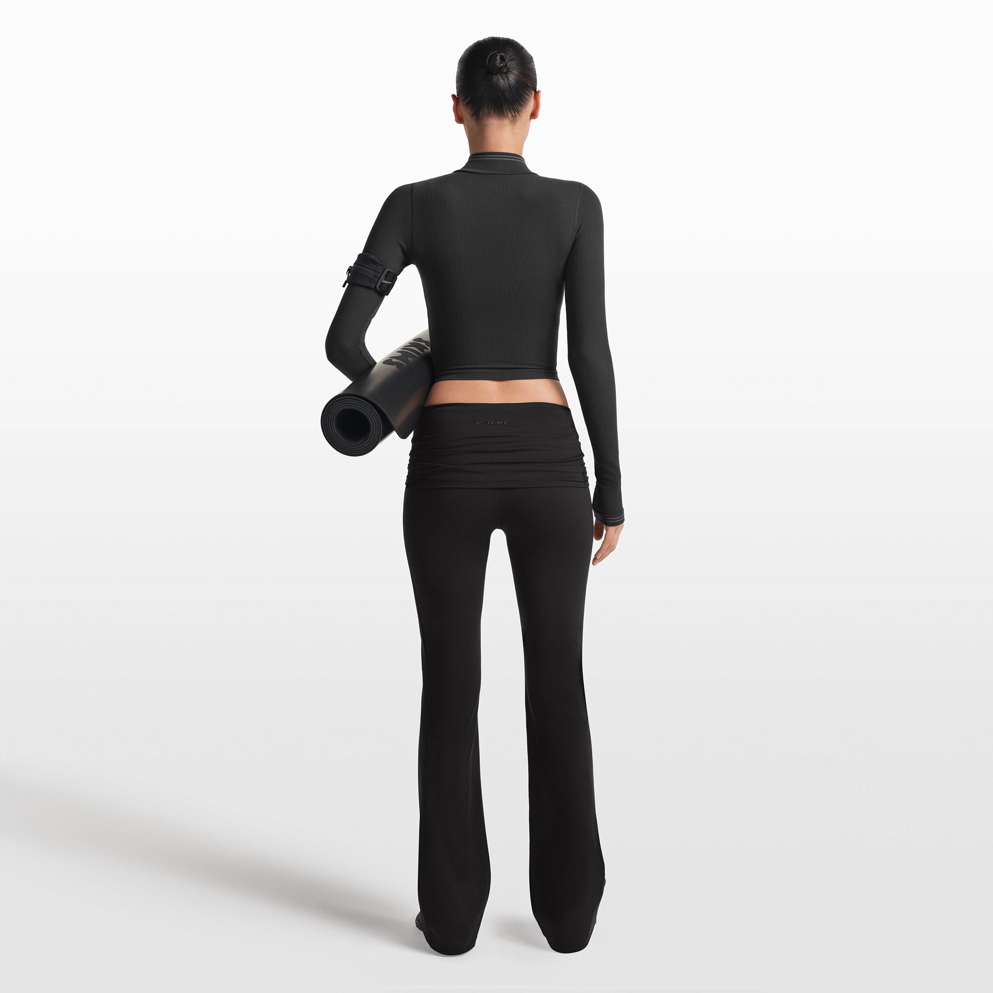 NikeSKIMS MATTE FOLDOVER SLIM FLARE LEGGING | OBSIDIAN - Image 5