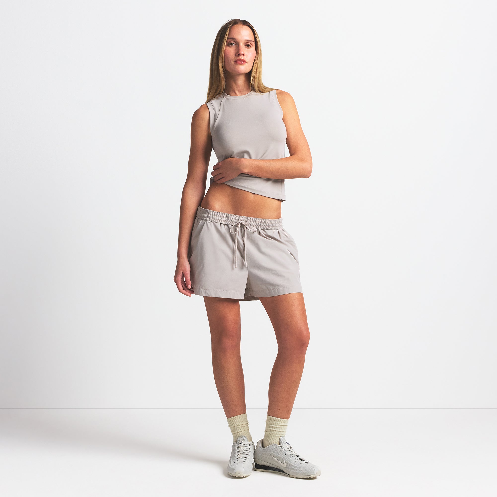 NikeSKIMS WOVEN NYLON 5 TRACK SHORT | STONE - Image 2