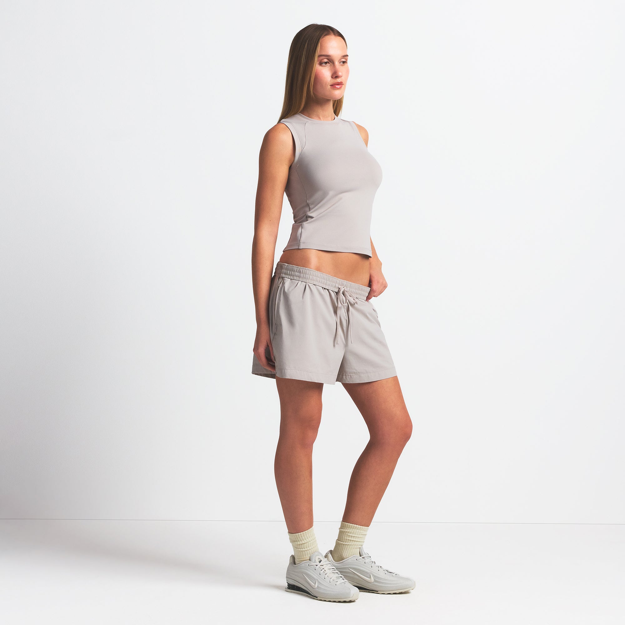 NikeSKIMS WOVEN NYLON 5 TRACK SHORT | STONE - Image 4