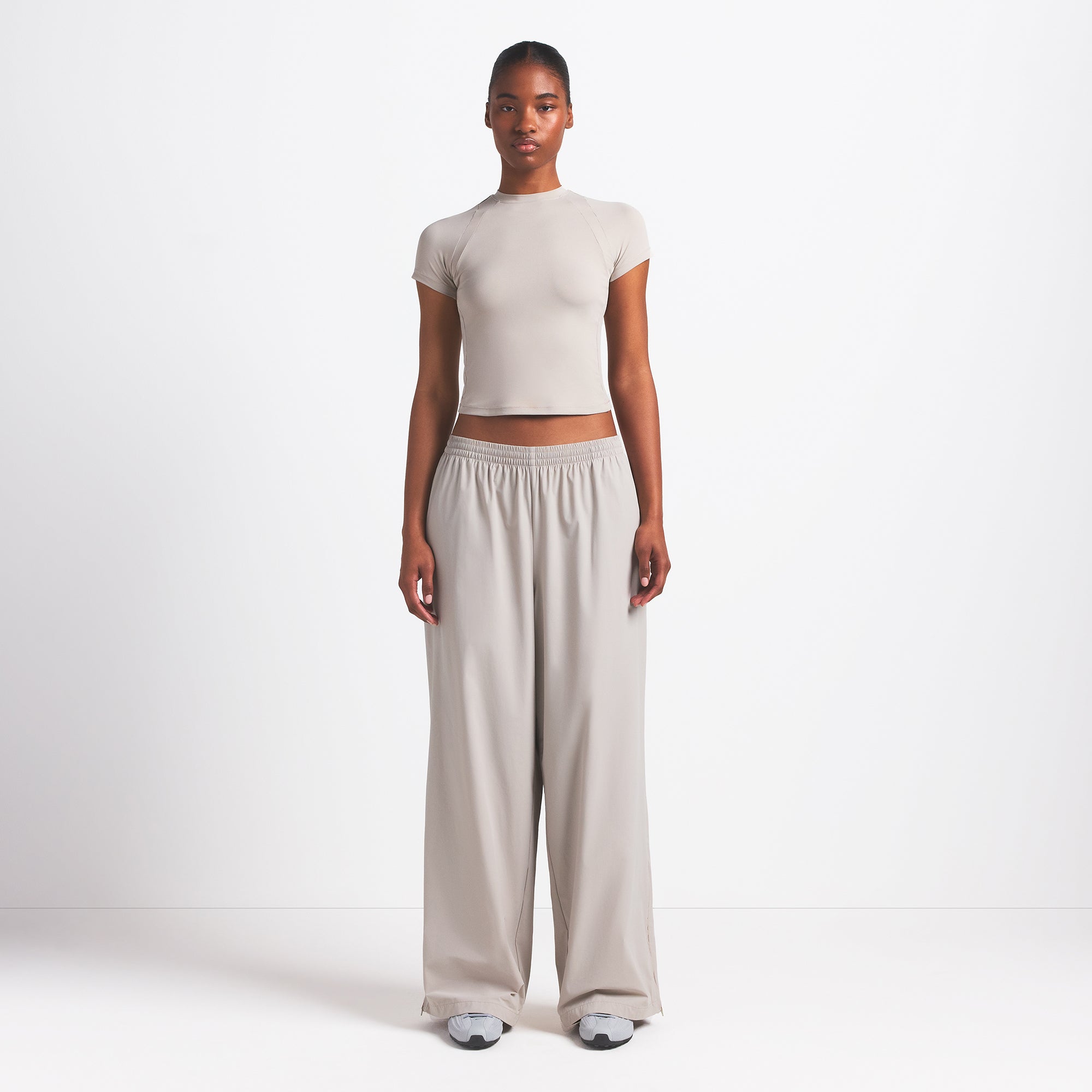 NikeSKIMS WOVEN NYLON OVERSIZED TRACK PANT | STONE - Image 2