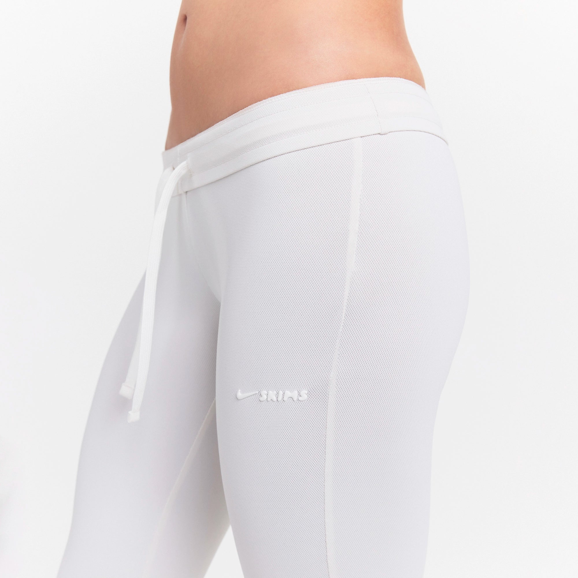 NikeSKIMS AIRY DRI-FITâ„¢ LOW RISE MINI FLARE PANT | IVORY - Image 4
