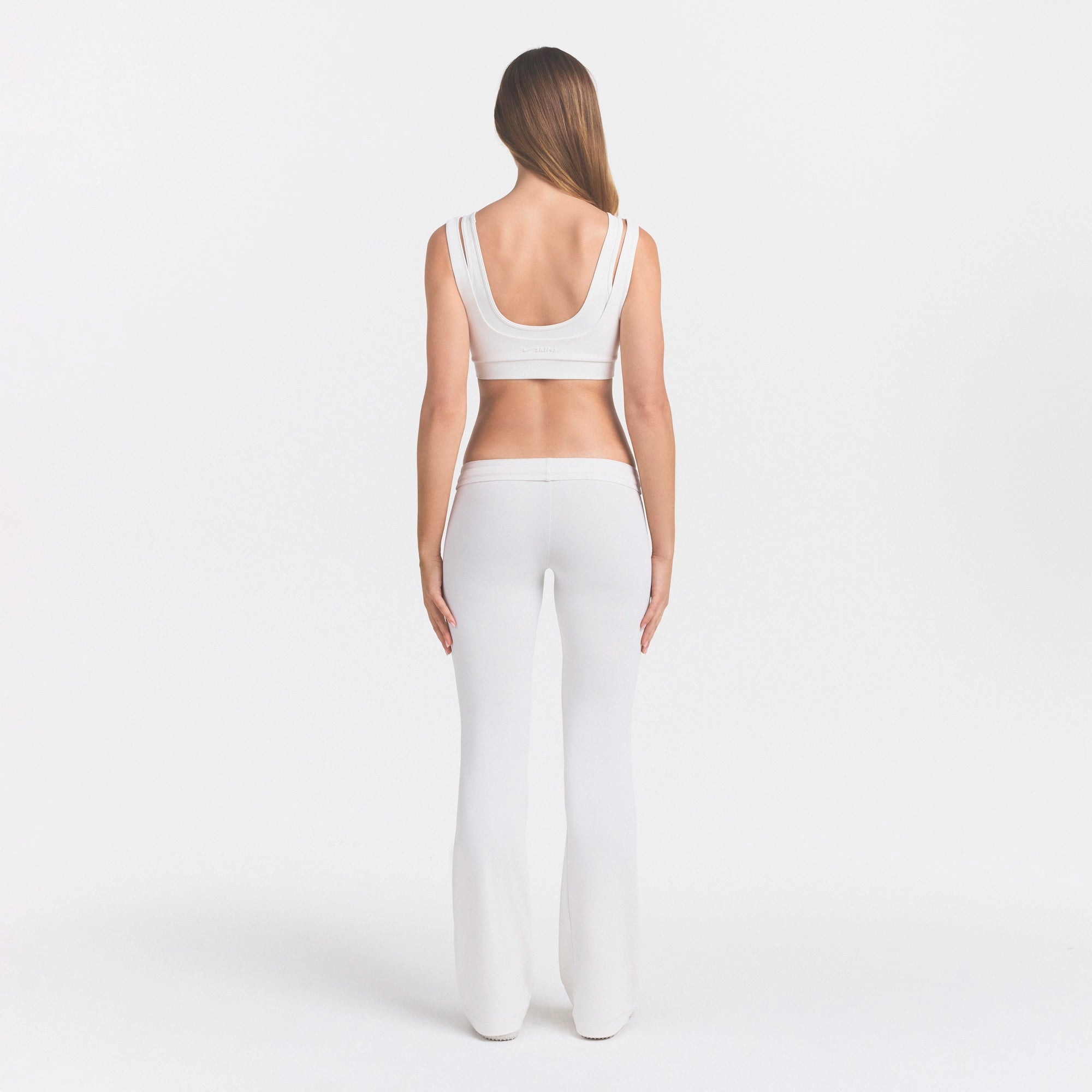 NikeSKIMS AIRY DRI-FITâ„¢ LOW RISE MINI FLARE PANT | IVORY - Image 5