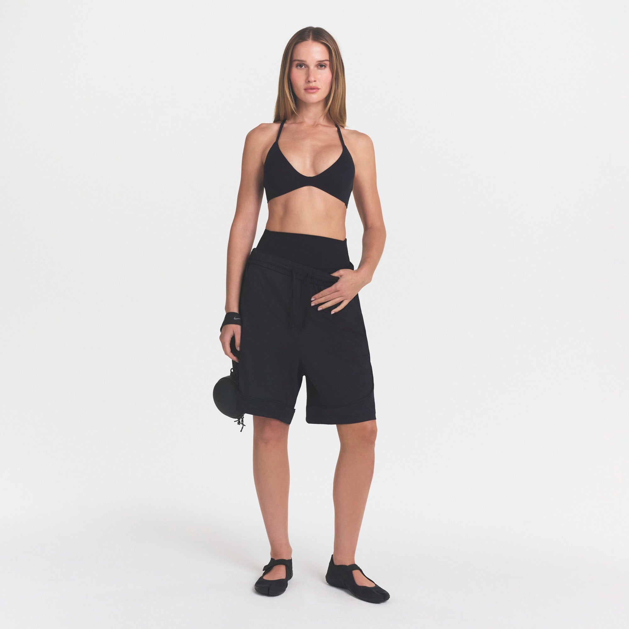 NikeSKIMS STUDIO STRETCH T-BACK TRIANGLE BRA | OBSIDIAN - Image 2