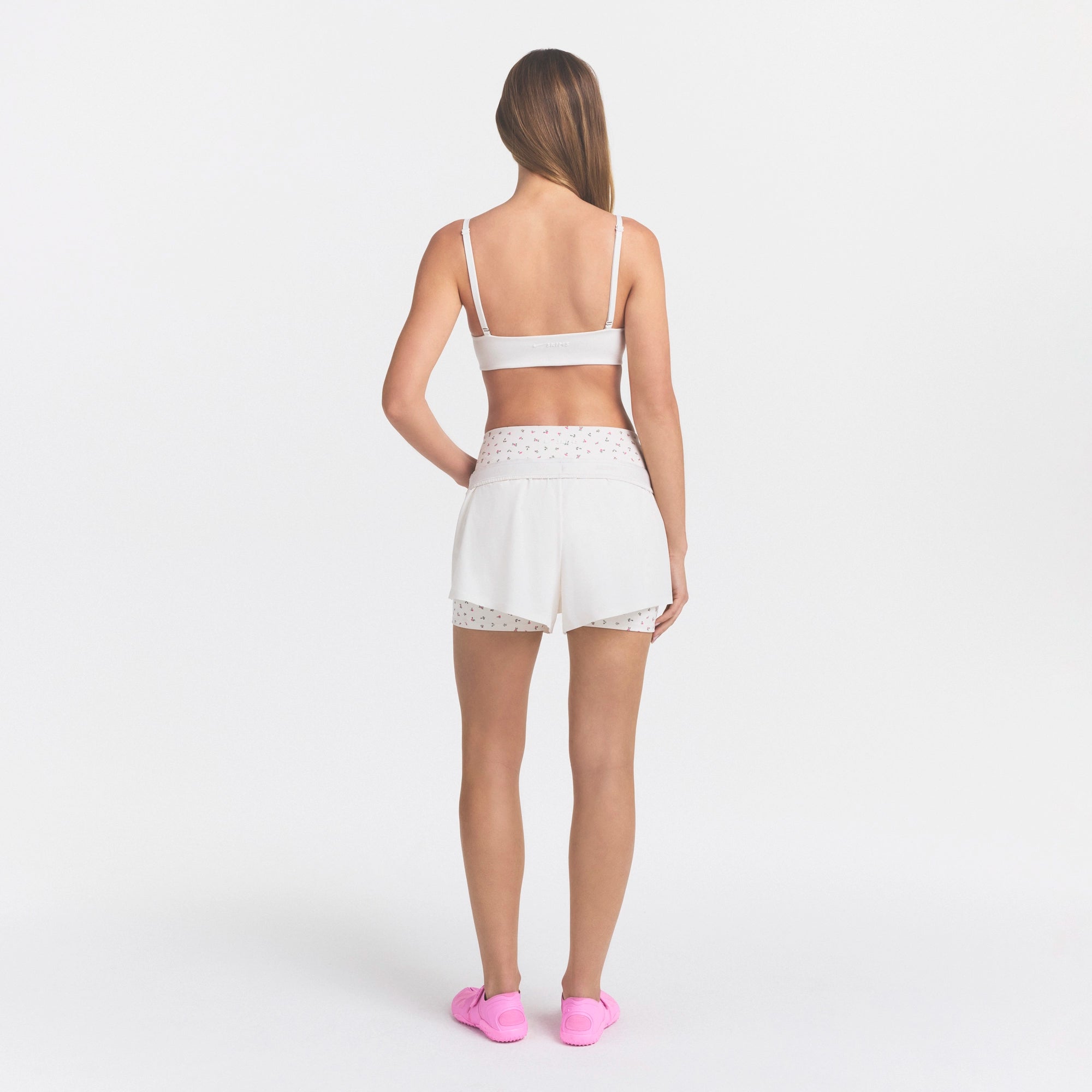 NikeSKIMS STRETCH NYLON RUNNER SHORT | IVORY - Image 5