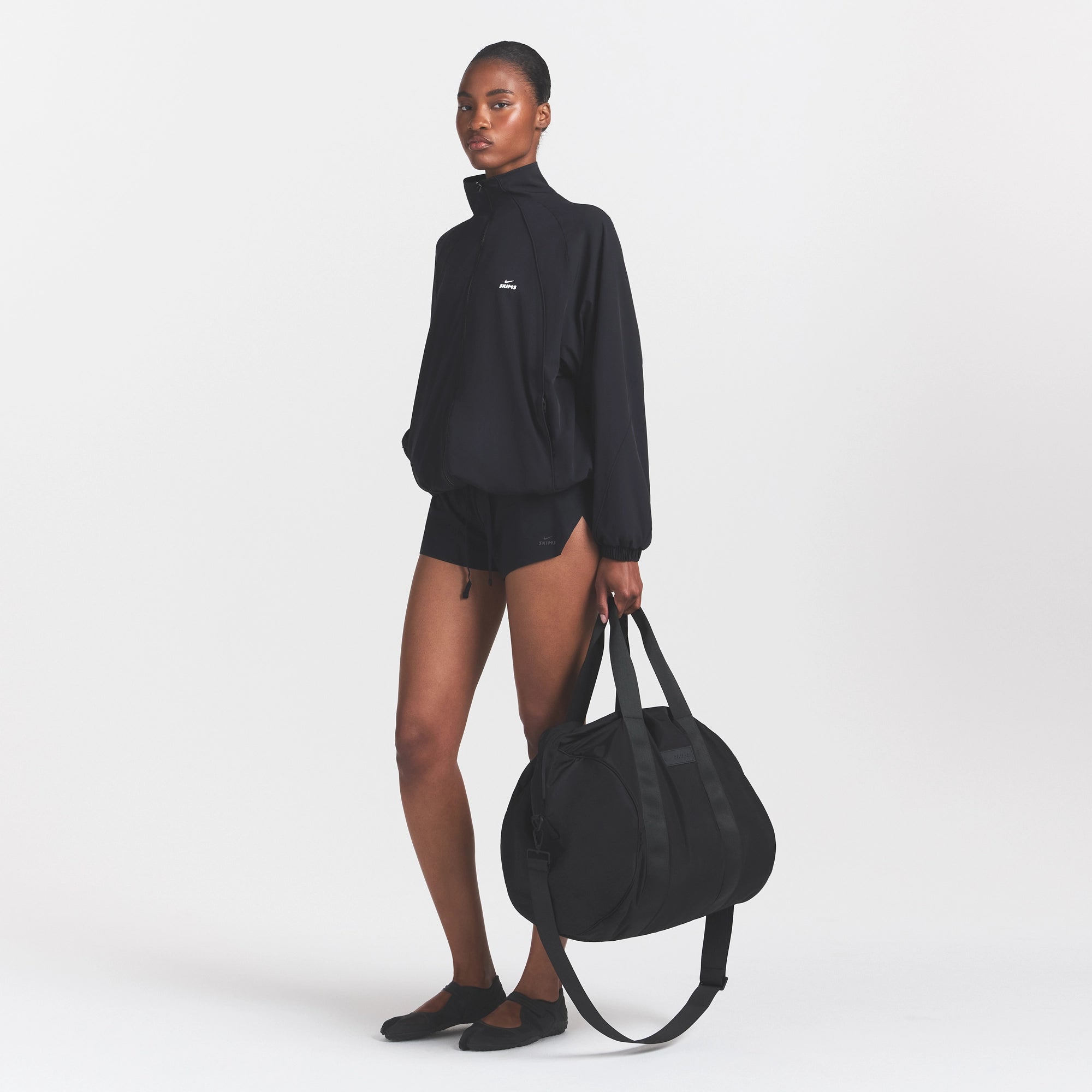 NikeSKIMS ACCESSORIES PUFFER GYM BAG | OBSIDIAN - Image 2
