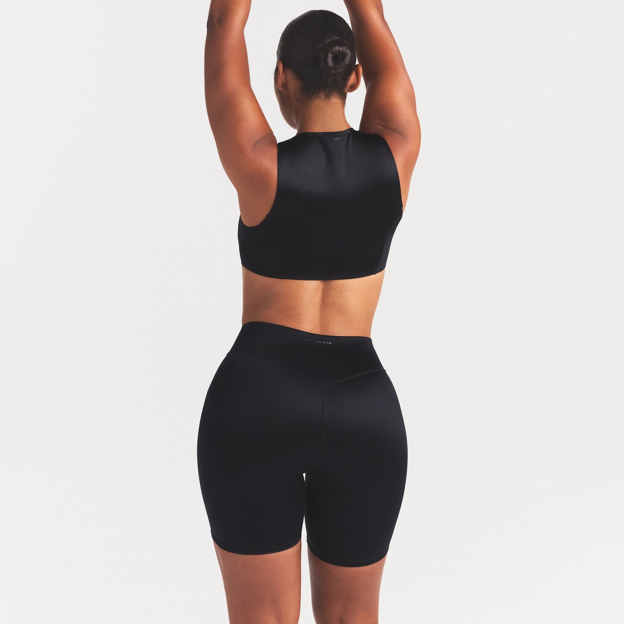 NikeSKIMS SATIN SHINE BONDED WAIST 7 BIKER SHORT | OBSIDIAN - Image 5