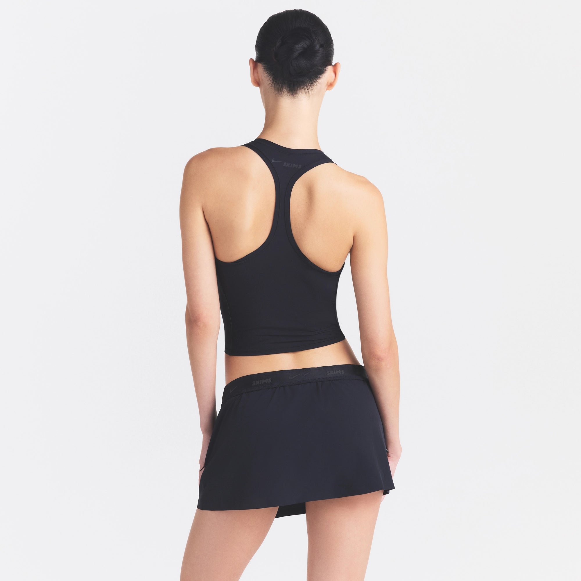 NikeSKIMS STRETCH NYLON SKORT | OBSIDIAN - Image 4