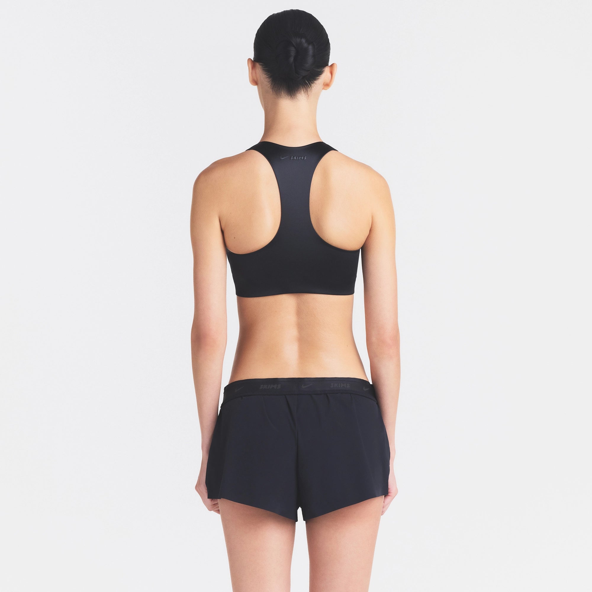 NikeSKIMS STRETCH NYLON RUNNER SHORT | OBSIDIAN - Image 4