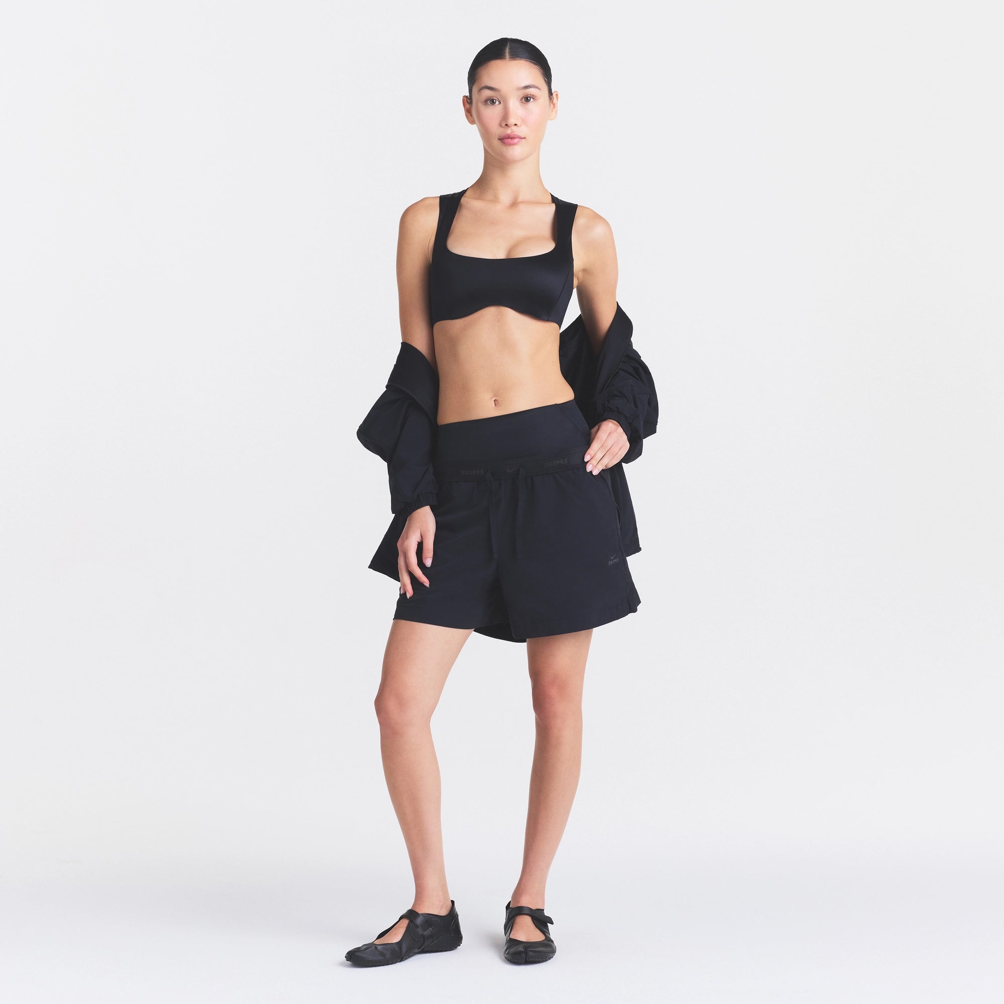 NikeSKIMS STRETCH NYLON 5 TRACK SHORT | OBSIDIAN - Image 2