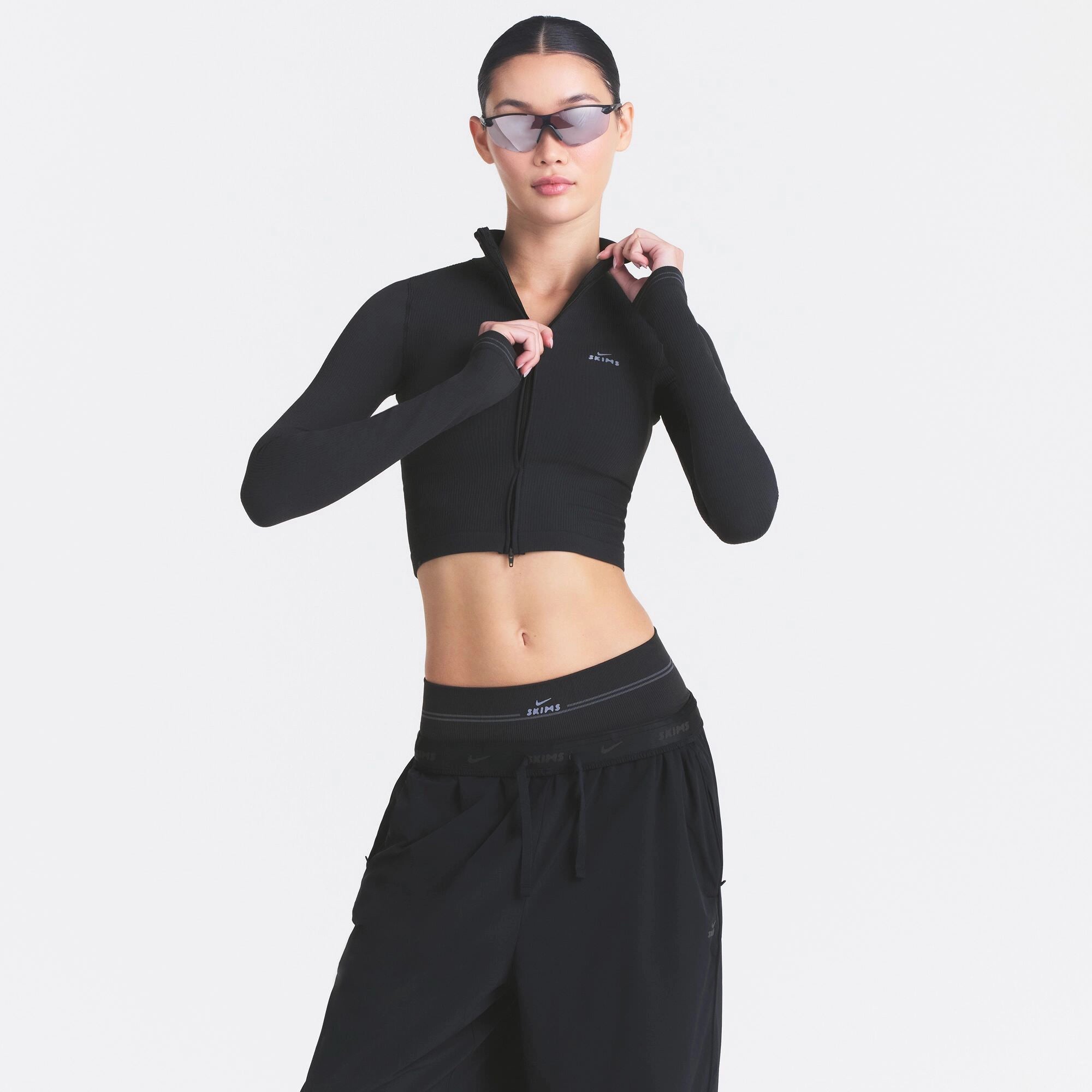 NikeSKIMS RIBBED SEAMLESS ZIP UP CROP JACKET | OBSIDIAN - Image 5