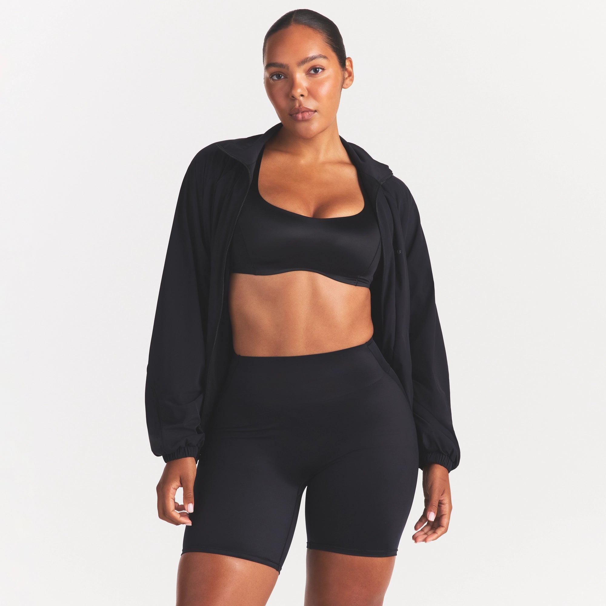 NikeSKIMS STRETCH NYLON OVERSIZED TRACK JACKET | OBSIDIAN - Image 4