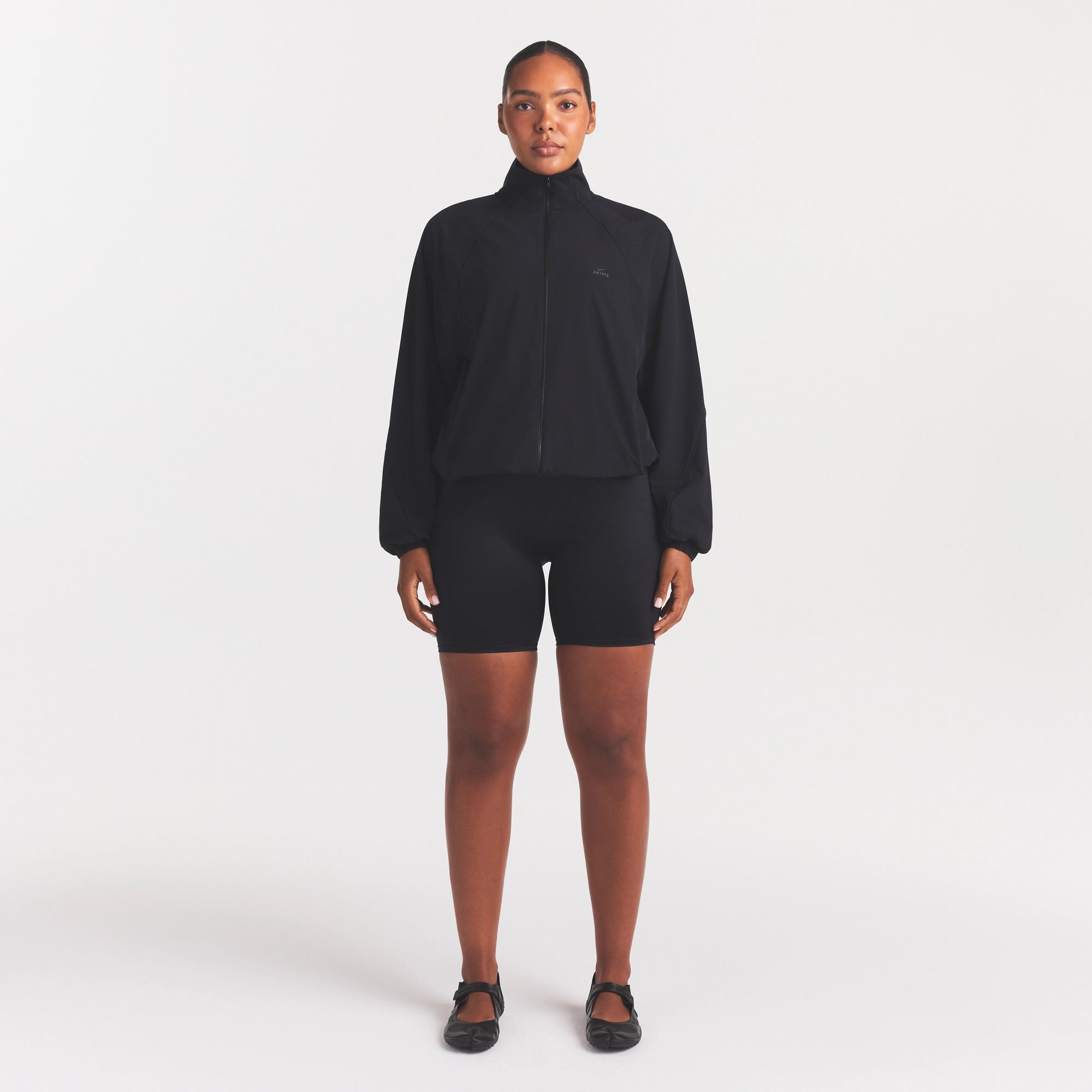 NikeSKIMS STRETCH NYLON OVERSIZED TRACK JACKET | OBSIDIAN - Image 3