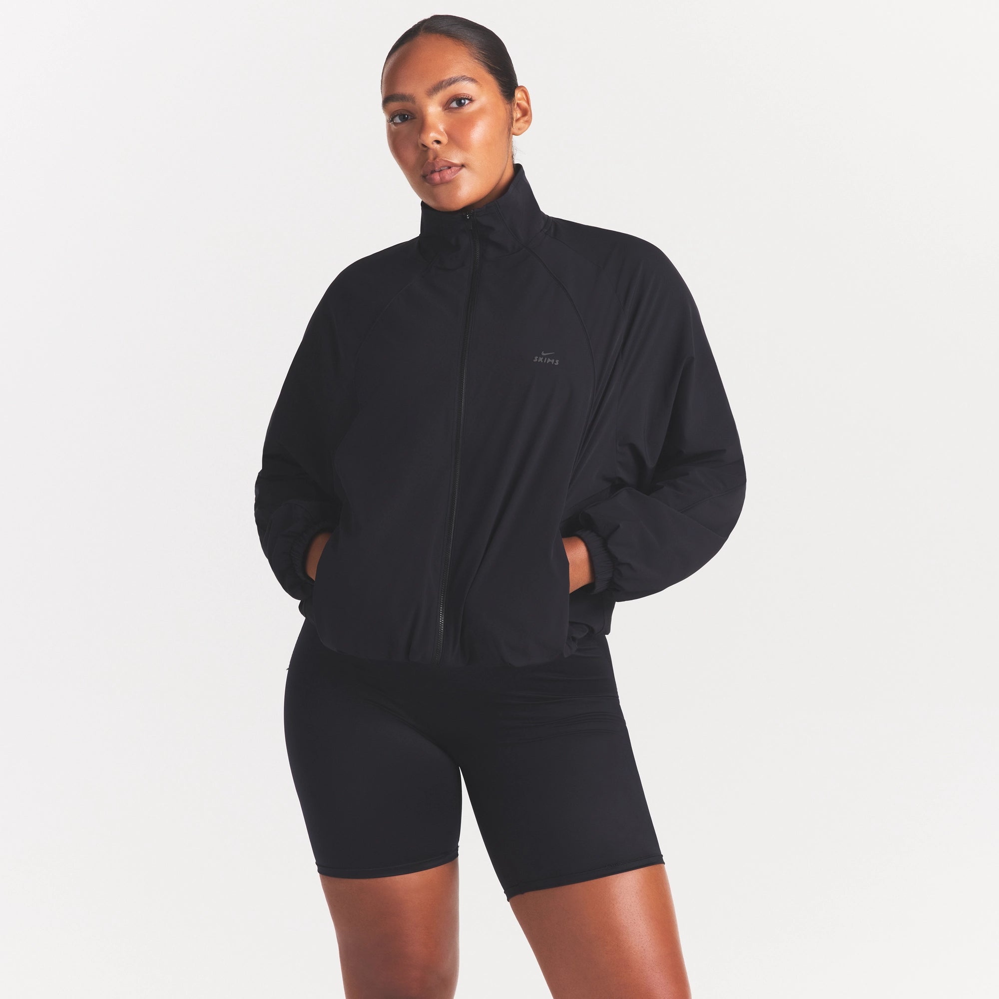 NikeSKIMS STRETCH NYLON OVERSIZED TRACK JACKET | OBSIDIAN - Image 2