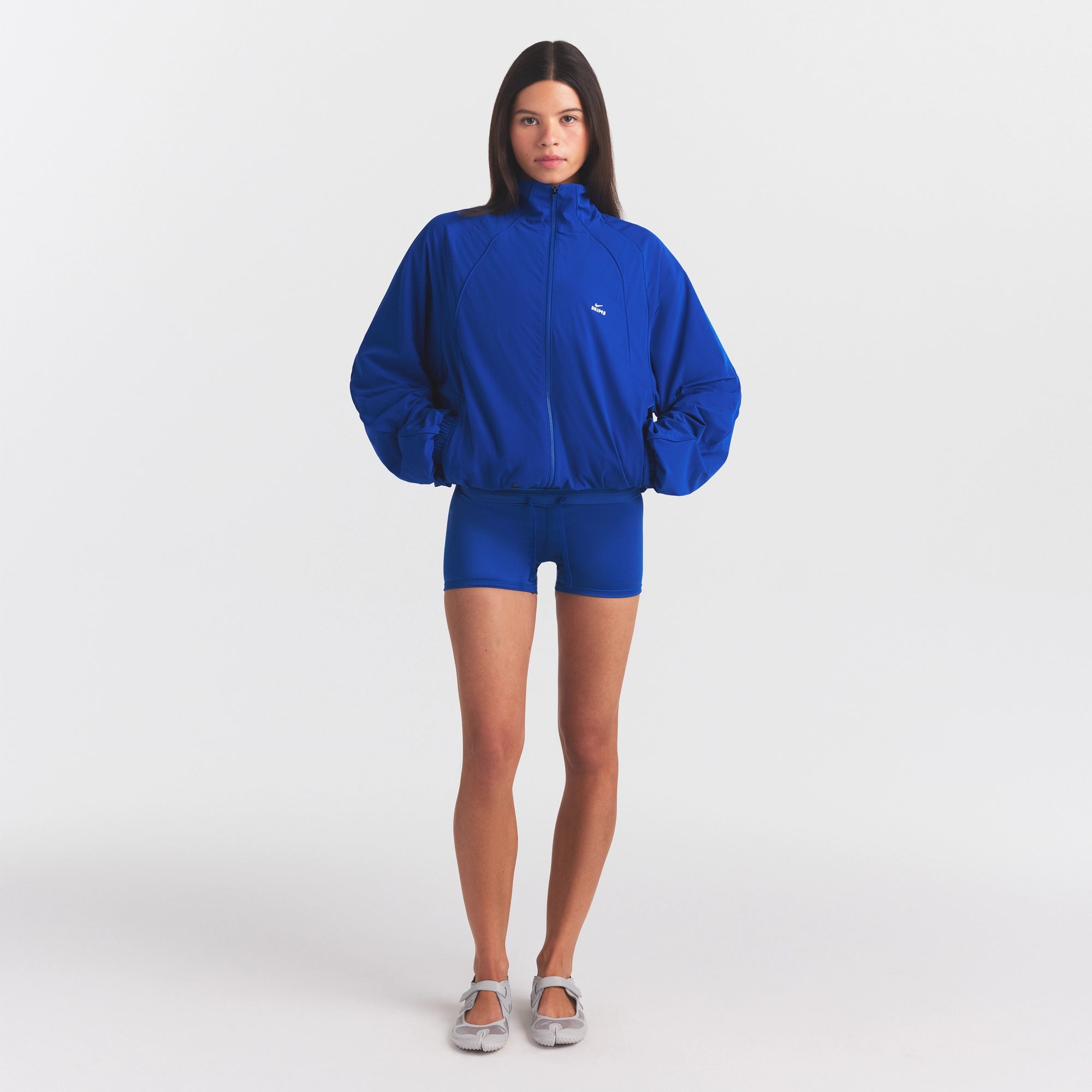 NikeSKIMS STRETCH NYLON OVERSIZED TRACK JACKET | COBALT - Image 2
