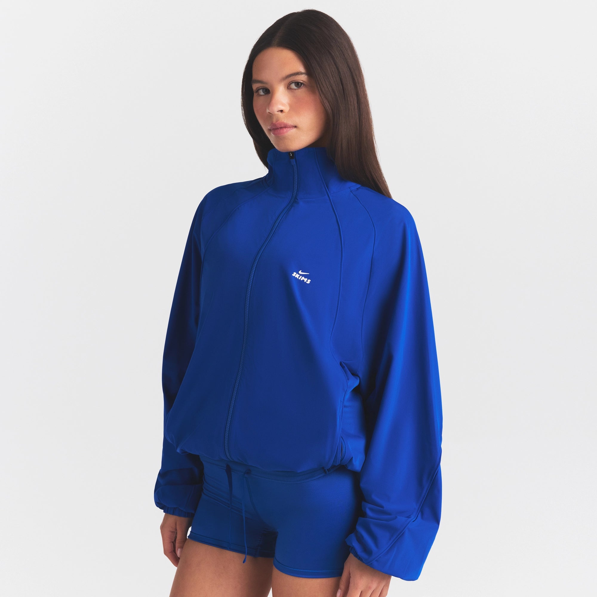NikeSKIMS STRETCH NYLON OVERSIZED TRACK JACKET | COBALT - Image 4